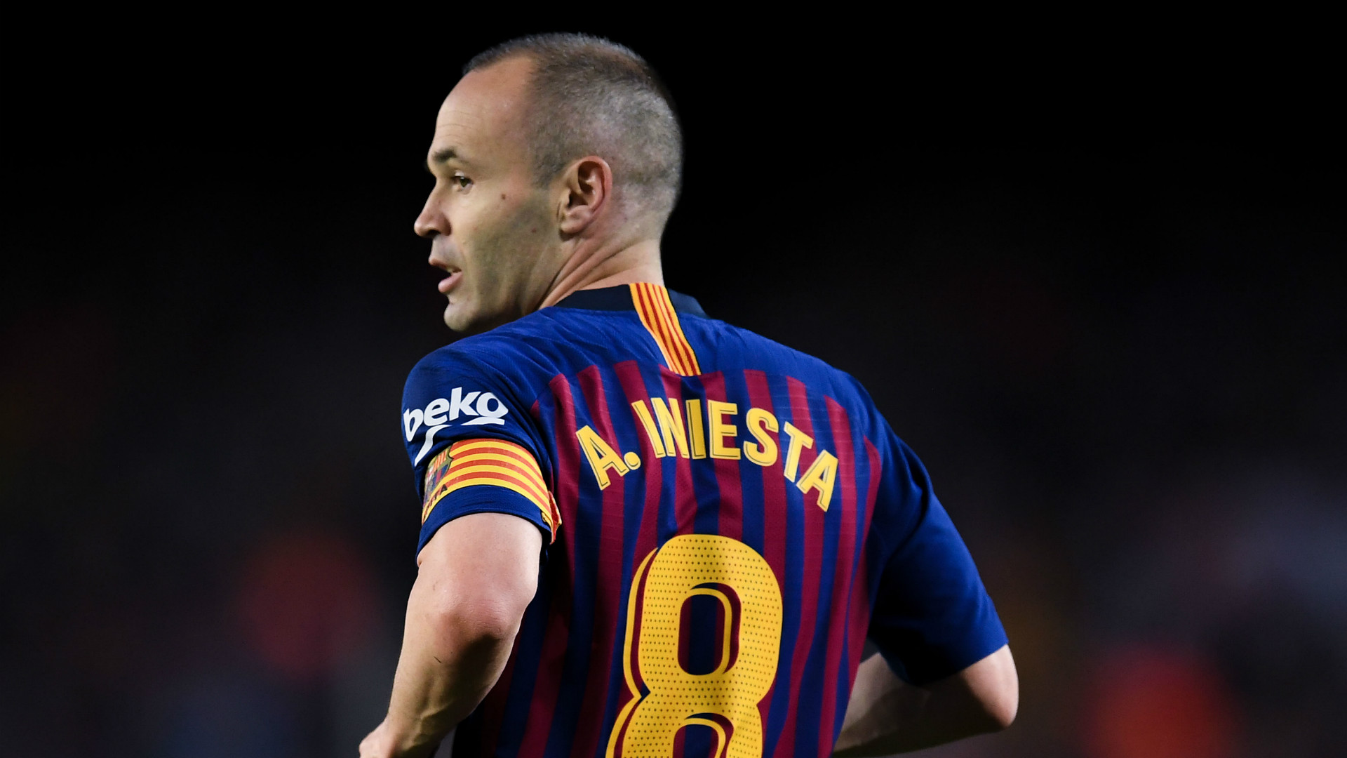What was written on Iniesta shirt?