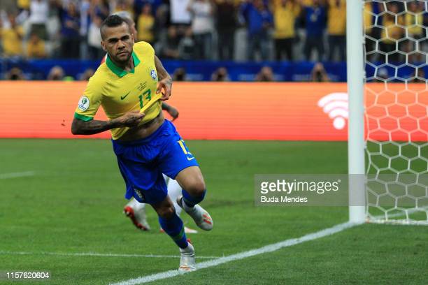 How many trophies Dani Alves won?