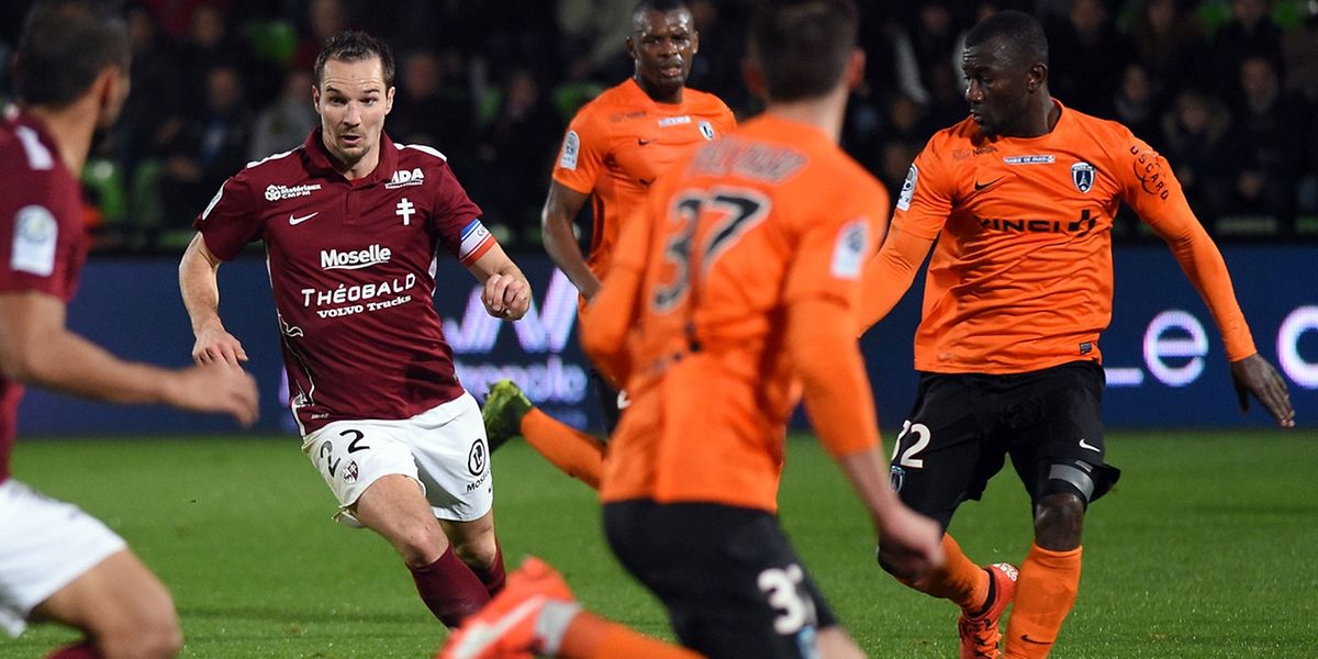Pourquoi le FC Metz joue en grenat ?